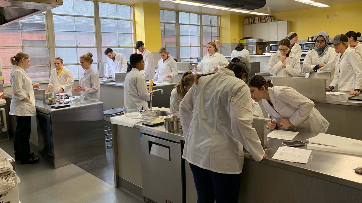 Experiments in a foods laboratory.