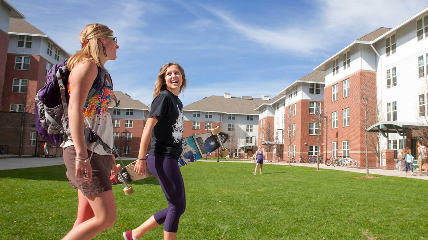 Students walking in front of the LLCs