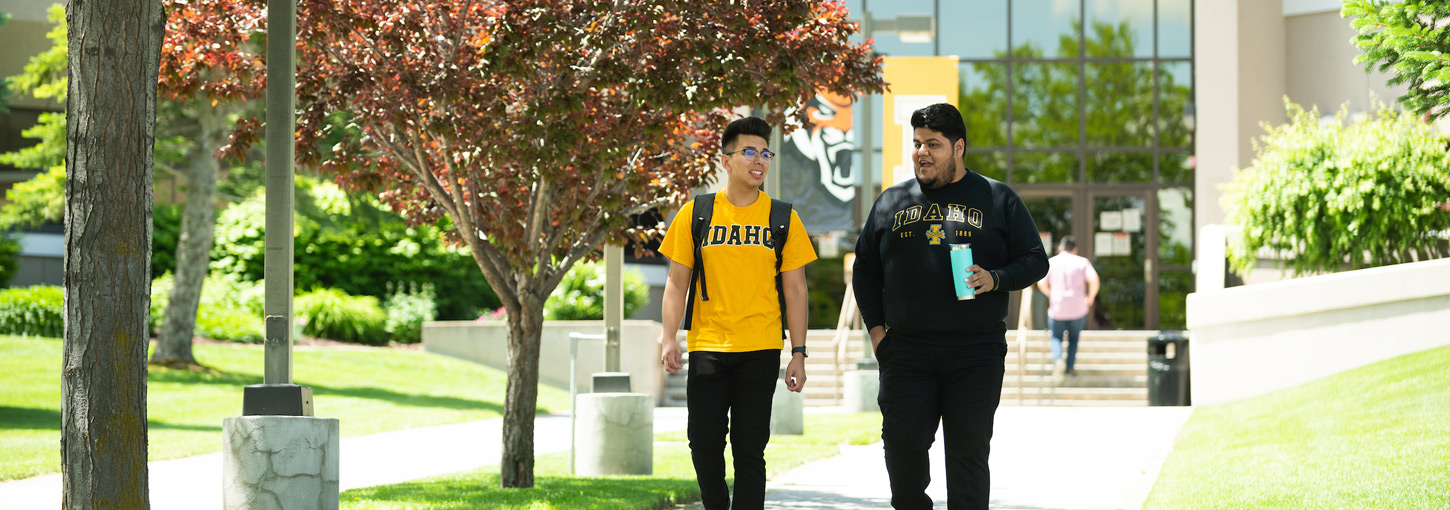 Students walk from the University Place building.