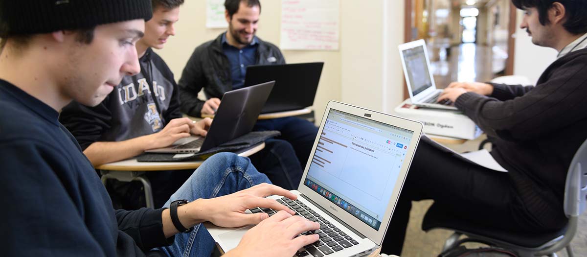 Students studying on laptops